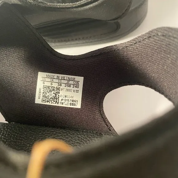 Adidas Black Sandals with Adjustable Straps and Contoured Footbed Adolette