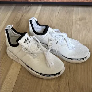Adidas White and Black Bloost Sneakers Minimalist Design
