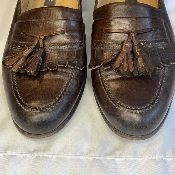 Bally Leather Tassel Accent Loafers
