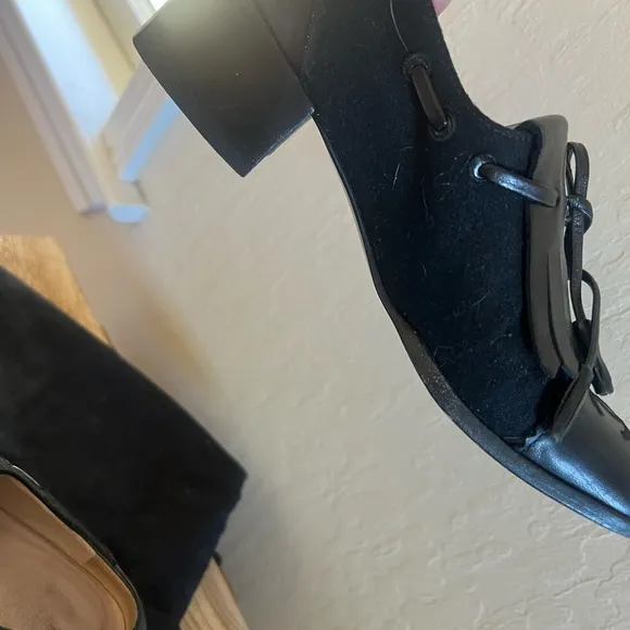 CHANEL Black Leather Fringe Loafers
