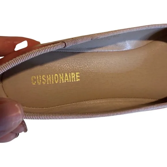 Cushionaire Pink Metallic ballet flats with bow accent.