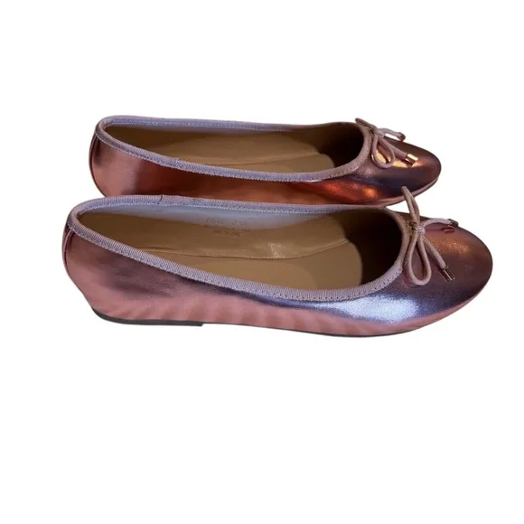 Cushionaire Pink Metallic ballet flats with bow accent.