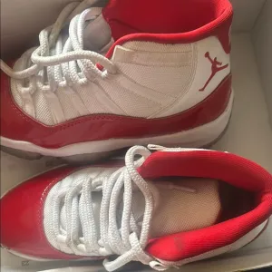 Jordan Red and White Athletic Sneakers