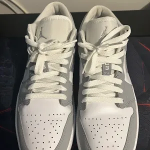 Jordan White and Gray Low-Top Sneakers