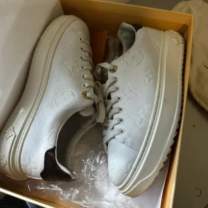 Louis Vuitton White High-Top Sneakers Minimalist Design
