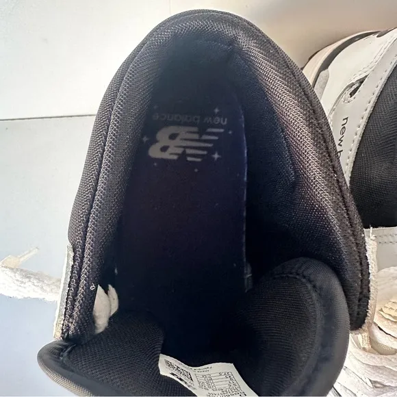New Balance White and Black Sneakers with Classic Design