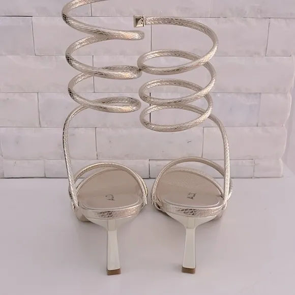 NIB. Aldo Twirly Snake Embossed Ankle Wrap Heeled Sandal in Metallic Gold  7.5