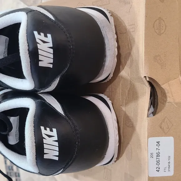 Nike Black and White Sneakers with Leather-like Upper. CORTEZ BASIC LEATHER '06