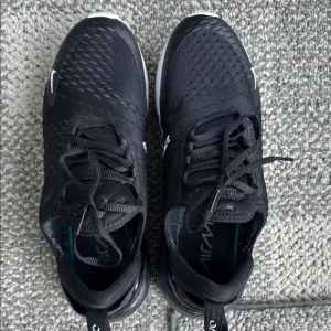 Nike Black Sneakers with Textured Design