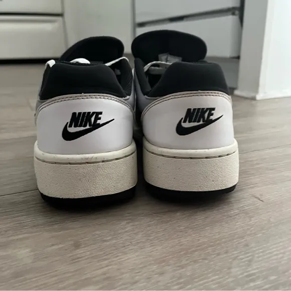 Nike White and Black Low-Top Sneakers with Red Accent