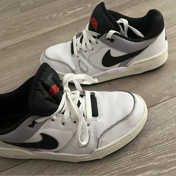 Nike White and Black Low-Top Sneakers with Red Accent