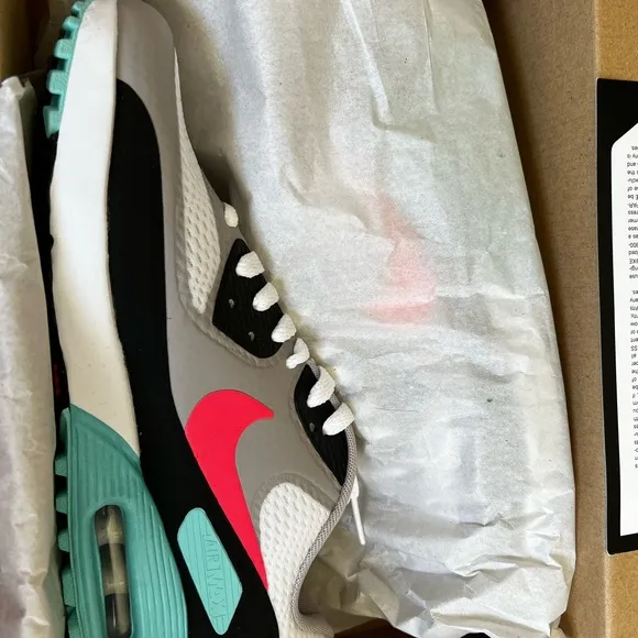 Nike White and Black Sneakers with Air Max Cushioning