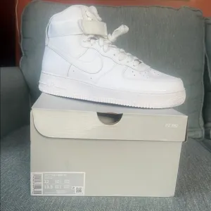 Nike White High-Top Sneakers with Lace-Up Closure