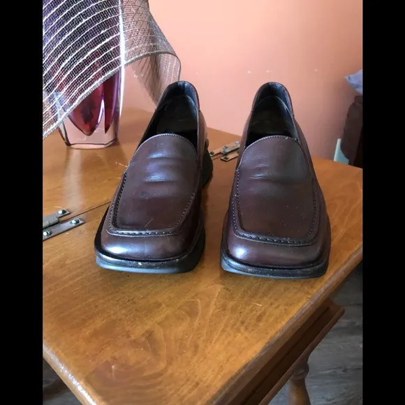 PRADA chocolate brown slip-on leather loafers