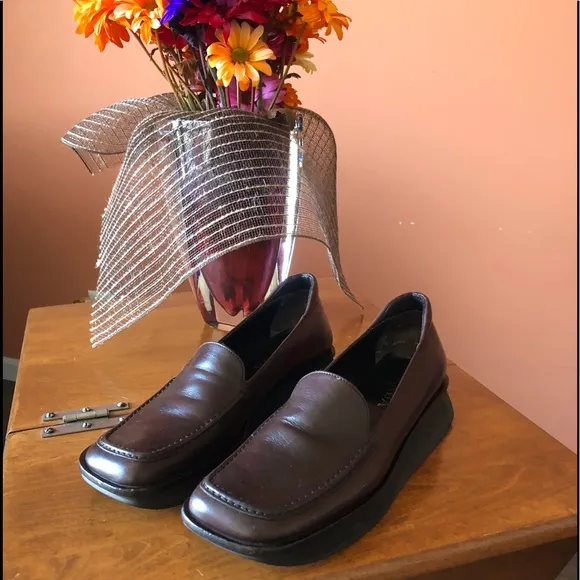 PRADA chocolate brown slip-on leather loafers