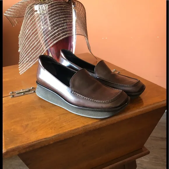 PRADA chocolate brown slip-on leather loafers