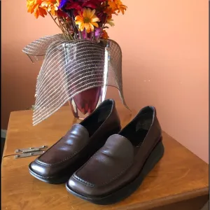 PRADA chocolate brown slip-on leather loafers