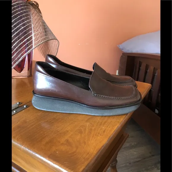 PRADA chocolate brown slip-on leather loafers