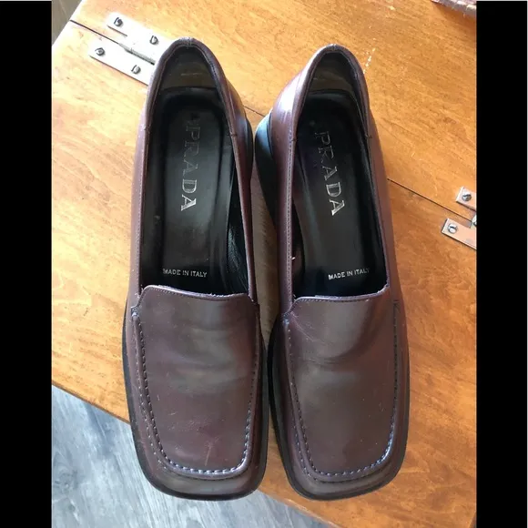 PRADA chocolate brown slip-on leather loafers