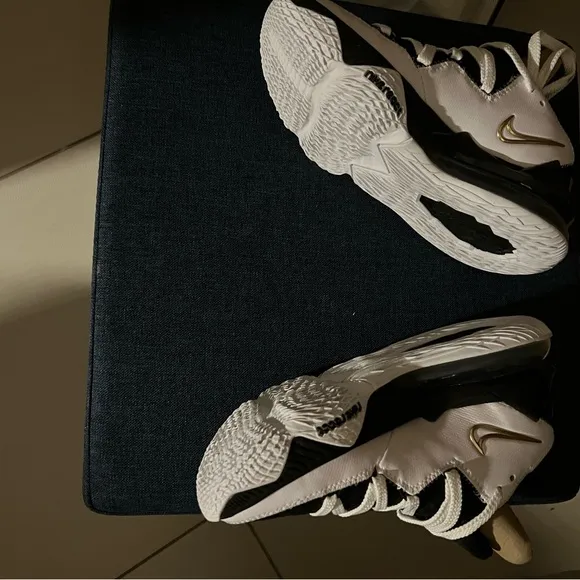 Sleek Gold and Black Sneakers for Versatile Style
