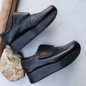 Stephane Kelian black leather loafers