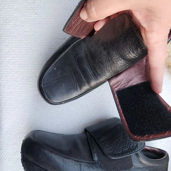Stephane Kelian black leather loafers